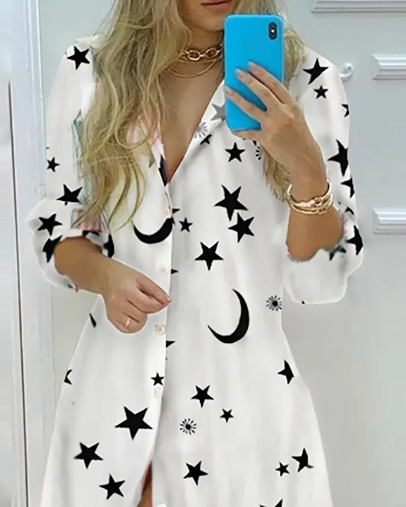 White long sleeve shirt dress with black star and moon print, single-breasted polo neck, ankle-length casual retro style for women.