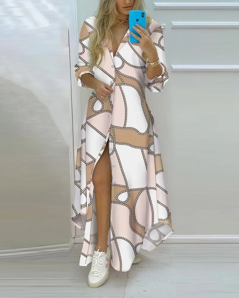 Women's long sleeve shirt dress with chain print, side slit, and pink bodice. Retro ankle-length casual dress.
