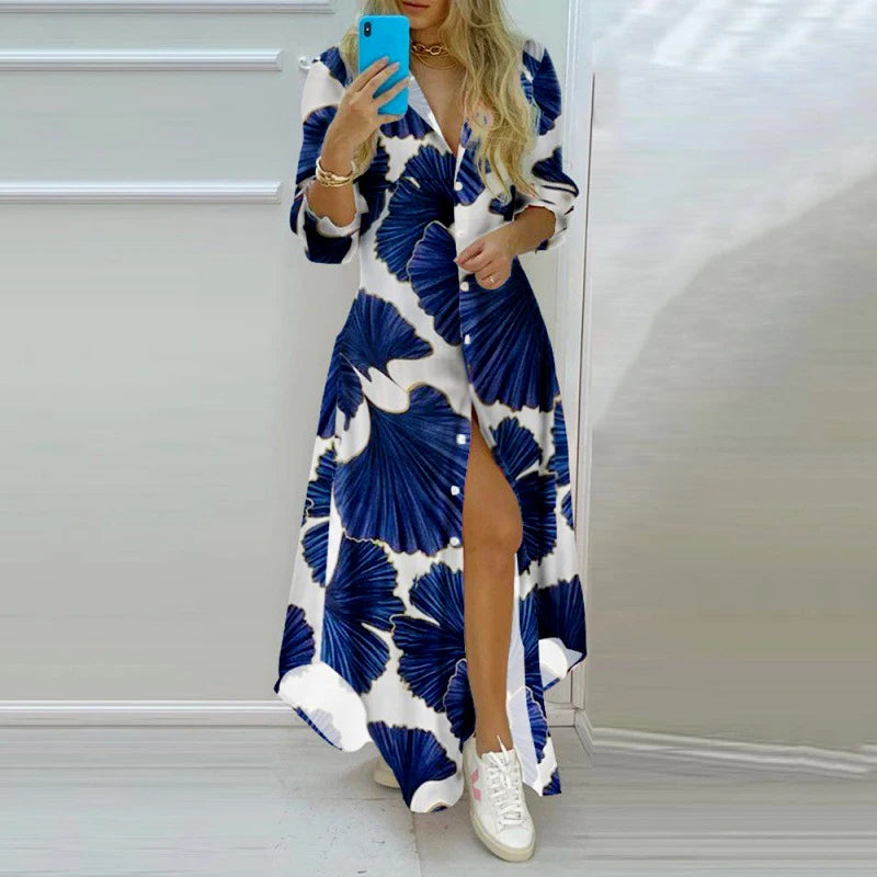 Blue and white ginkgo leaf print polo neck shirt dress with single-breasted buttons, side slit, and long sleeves.
